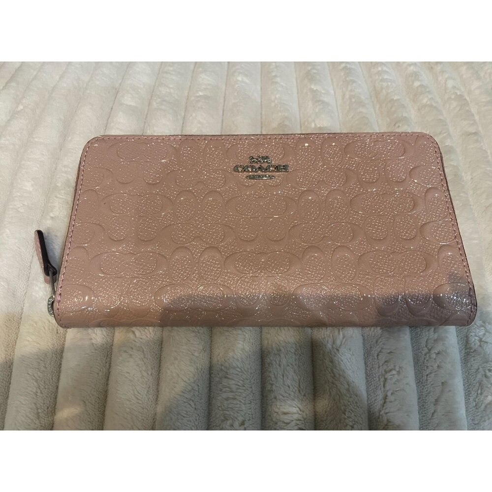 B318 - Coach Signature Debossed Patent Leather Accordion Zip Wallet in a blush p